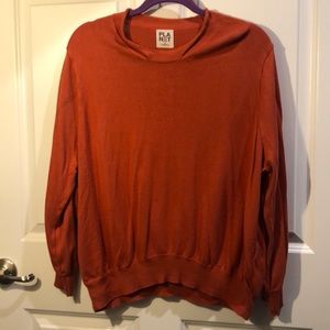 Thin, soft, blousey orange sweater